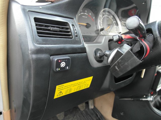 Кнопка переключения и индикации режимов работы ГБО  в салоне Great Wall SUV G5 на передней панели слева от руля