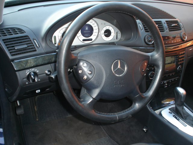 Кнопка переключения и индикации режимов работы ГБО в салоне Mercedes E-320