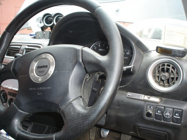 Кнопка переключения и индикации режимов работы ГБО в салоне Subaru Impreza WRX Wagon MT